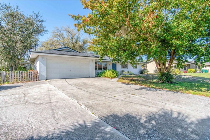 HUGE PRICE IMPROVEMENT ON THIS DOUBLE WATERFRONT LOT HOME! This - Beach Home for sale in Port Charlotte, Florida on Beachhouse.com