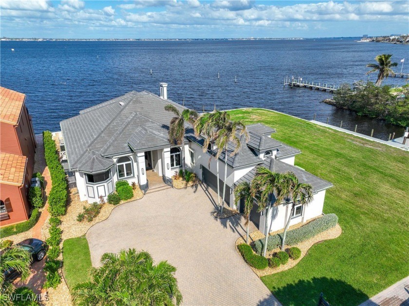 Exquisite Riverfront Estate in a Gated Community! Discover - Beach Home for sale in Fort Myers, Florida on Beachhouse.com