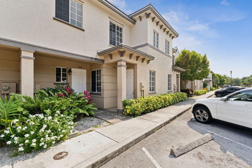 Experience the allure of this 2-bedroom, 2-bathroom first-floor - Beach Townhome/Townhouse for sale in Riviera Beach, Florida on Beachhouse.com