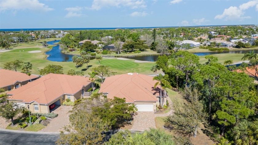 NOW WITH A BRAND NEW ROOF! ...Nestled on the golf course within - Beach Condo for sale in Punta Gorda, Florida on Beachhouse.com