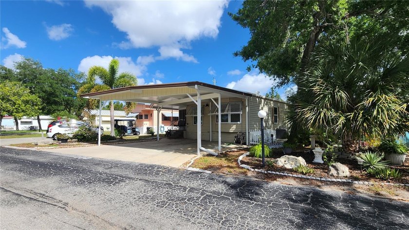 TWO BEDROOM, TWO BATHROOM MOBILE HOME IN ACTIVE 55+ COMMUNITY! - Beach Home for sale in Bradenton, Florida on Beachhouse.com