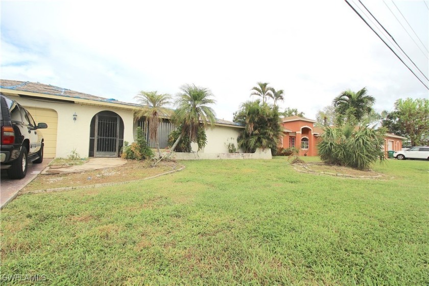 Welcome to this *diamond-in-the-very-rough* waterfront retreat - Beach Home for sale in Cape Coral, Florida on Beachhouse.com