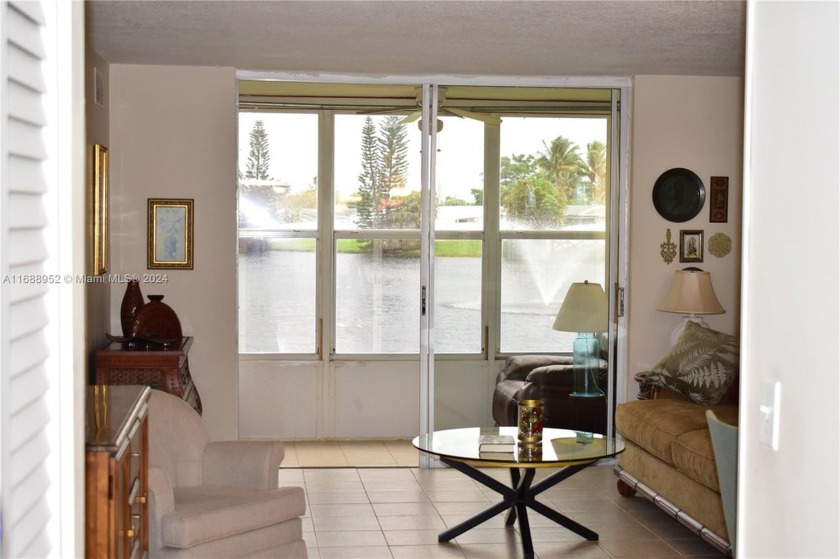 Impressive view from extra large windows toward the lake as you - Beach Condo for sale in Sunrise, Florida on Beachhouse.com