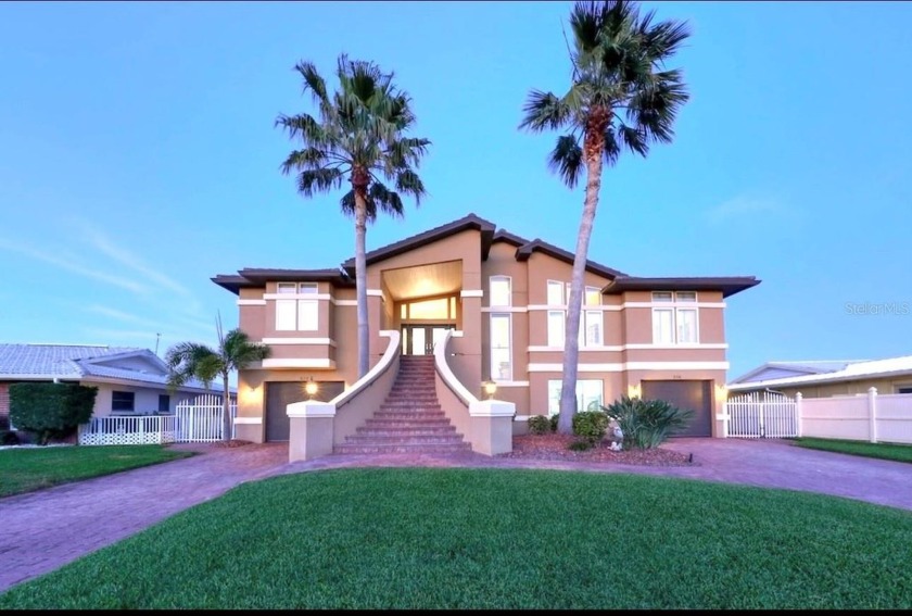 Welcome to your waterfront oasis! This luxurious 3-bedroom, 2/2 - Beach Home for sale in Indian Rocks Beach, Florida on Beachhouse.com