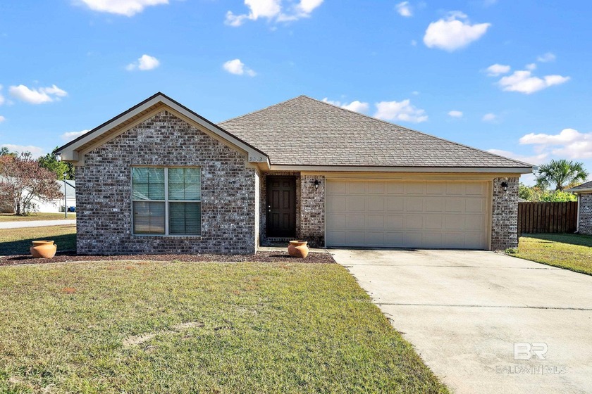 Beautifully built by Truland, this desirable 3BR/2BA home offers - Beach Home for sale in Foley, Alabama on Beachhouse.com