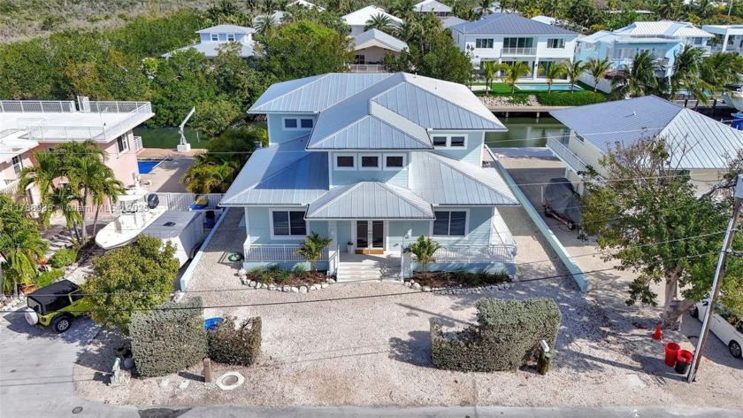 Modern Coastal Luxury in Islamorada! Built in 2019, this 4-bed - Beach Home for sale in Tavernier, Florida on Beachhouse.com