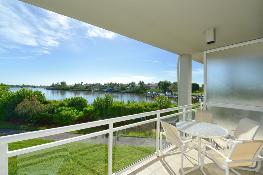 Welcome to resort-style living, tucked behind the prestigious - Beach Home for sale in Longboat Key, Florida on Beachhouse.com