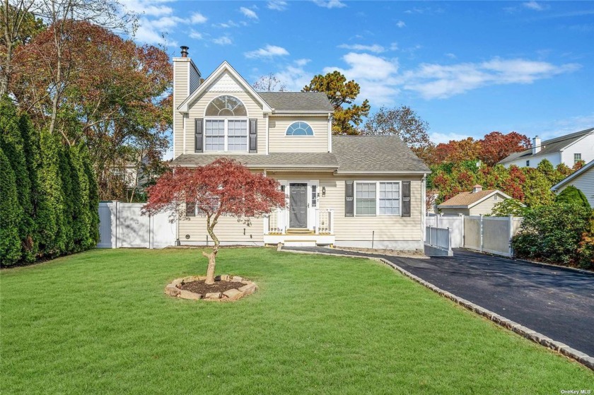 Welcome to this beautifully renovated 3/4 -bedroom, two-bathroom - Beach Home for sale in Mastic, New York on Beachhouse.com