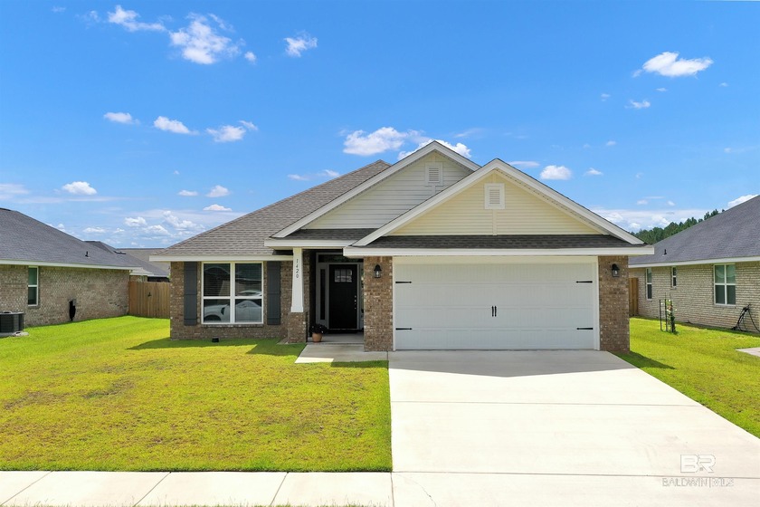 This meticulously maintained 4-bedroom, 2-bath home located in - Beach Home for sale in Foley, Alabama on Beachhouse.com