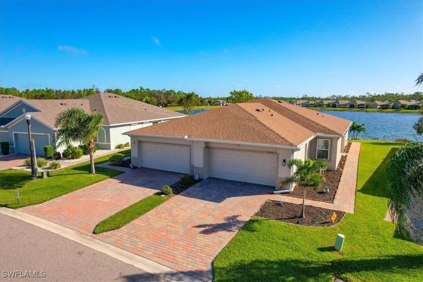 NEW Villa with a coastal vibe is now available in the golf - Beach Home for sale in North Fort Myers, Florida on Beachhouse.com