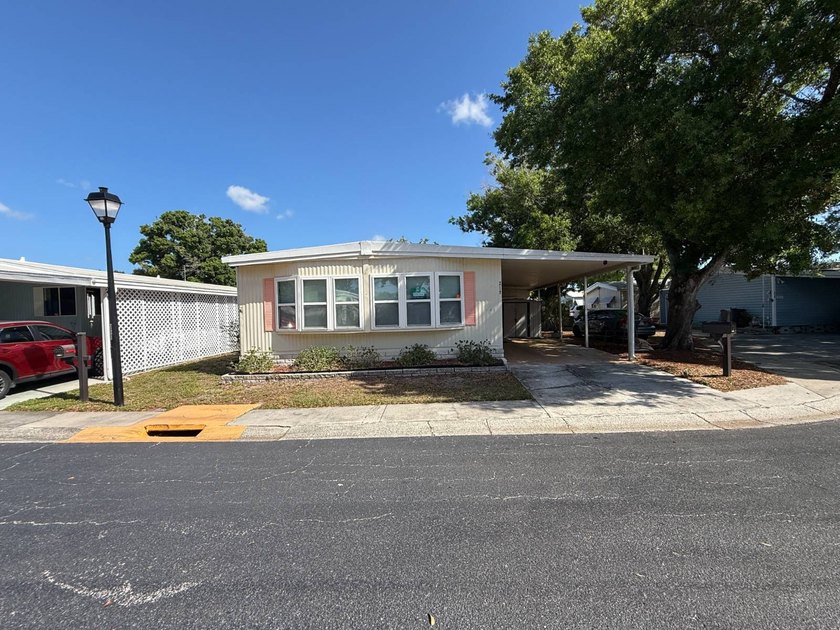 Experience the best of Florida living in this impeccably - Beach Home for sale in Largo, Florida on Beachhouse.com