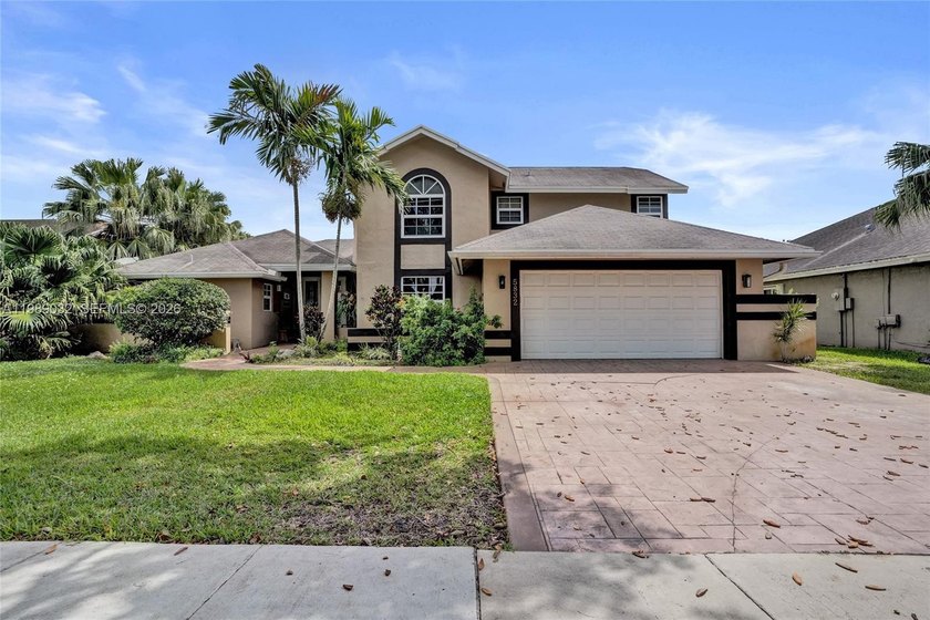 Welcome home to this Beautiful 4BR/3BA waterfront, pool home - Beach Home for sale in Cooper City, Florida on Beachhouse.com