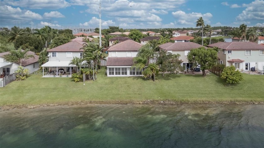 Welcome to your waterfront retreat in Bonita Lakes! This 4 bed - Beach Home for sale in Miami, Florida on Beachhouse.com