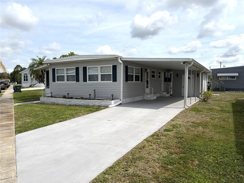 This residence showcases high-quality craftsmanship and includes - Beach Home for sale in Sarasota, Florida on Beachhouse.com