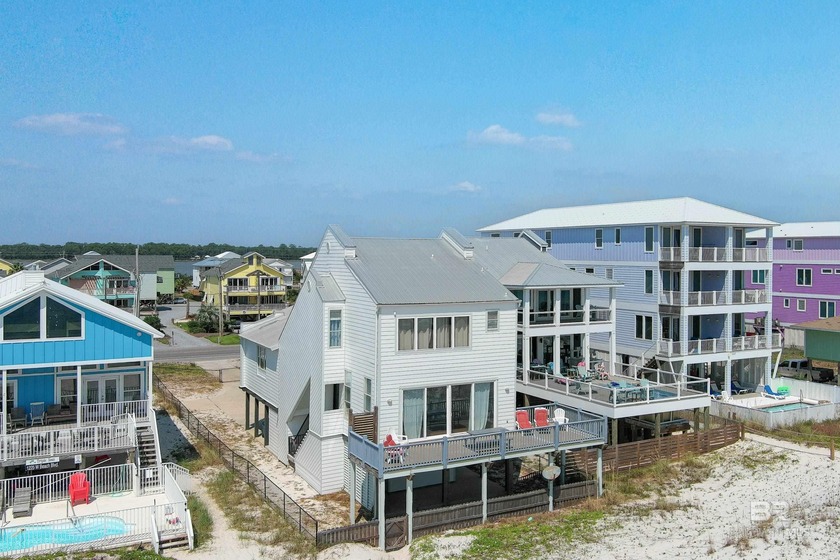 Step into a slice of paradise with this stunning 4-bedroom, 2 - Beach Townhome/Townhouse for sale in Gulf Shores, Alabama on Beachhouse.com