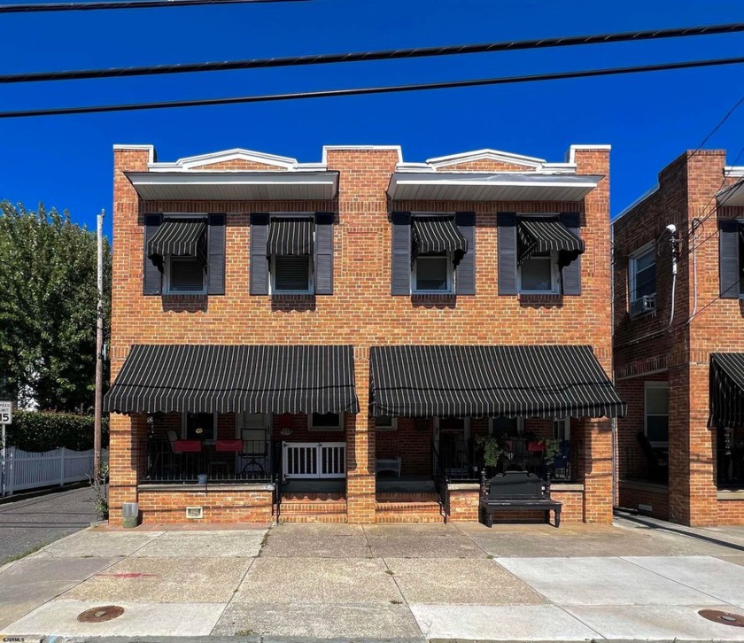 Welcome to 11 E. 13th Street, a charming end-unit townhouse! - Beach Home for sale in Ocean City, New Jersey on Beachhouse.com