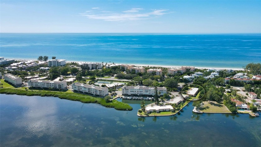 Welcome to easy living, island style! This waterfront villa - Beach Condo for sale in Longboat Key, Florida on Beachhouse.com