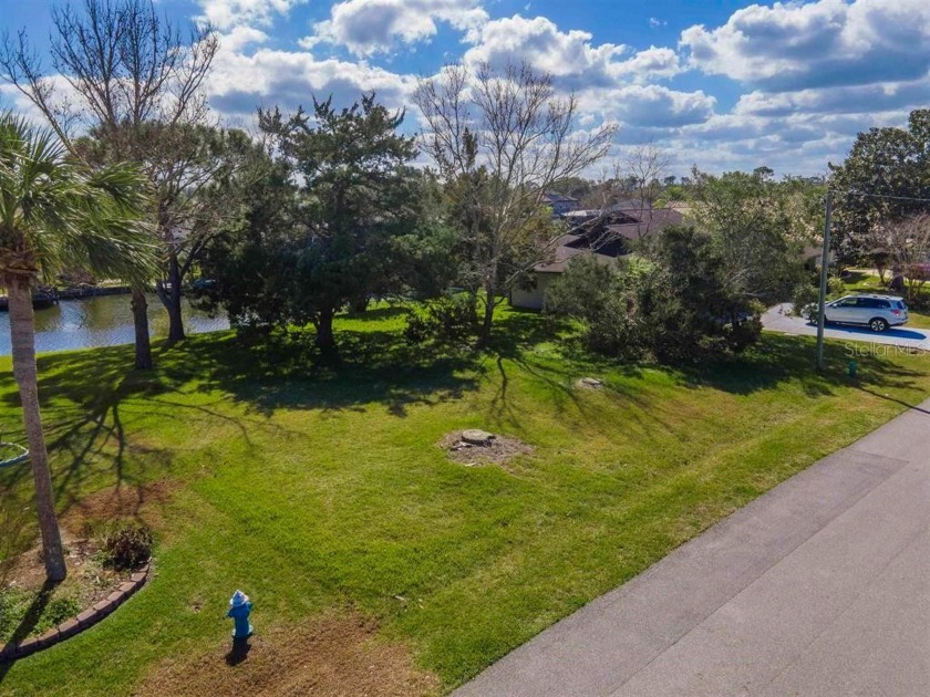 Build your dream home on this prime canal front property! Plenty - Beach Lot for sale in Palm Coast, Florida on Beachhouse.com