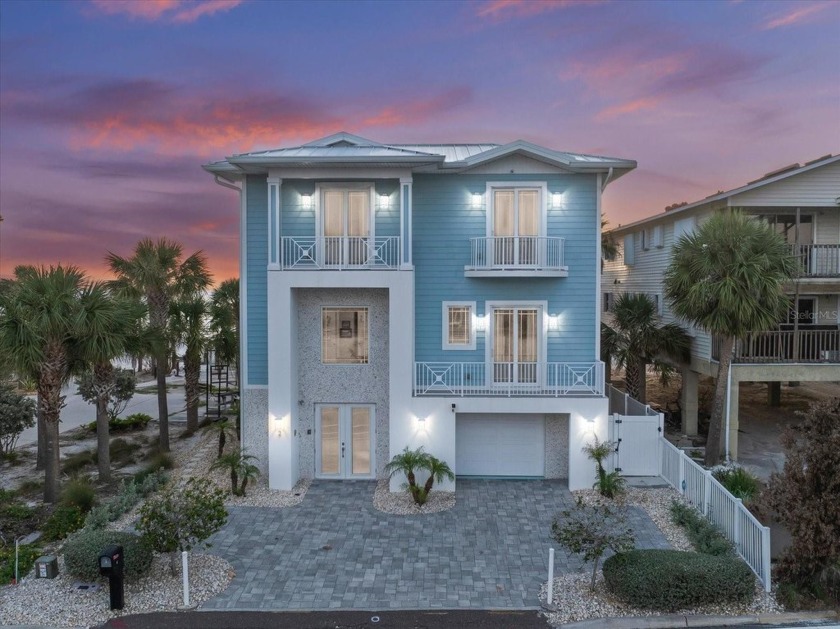 Welcome to an extraordinary coastal estate located directly on - Beach Home for sale in Indian Rocks Beach, Florida on Beachhouse.com