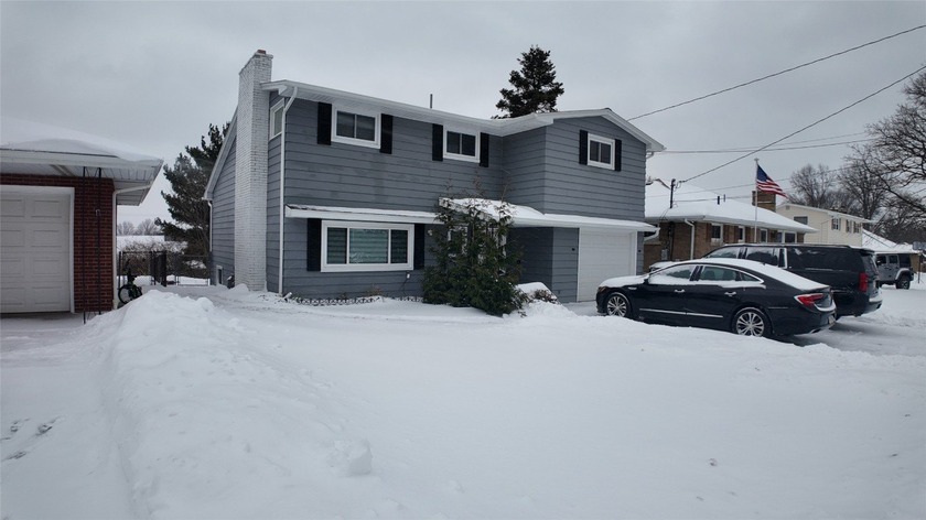 Welcome to this move-in-ready 4-bedroom, 1.5-bath home offering - Beach Home for sale in Erie, Pennsylvania on Beachhouse.com