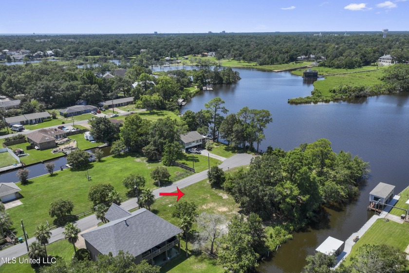 Prime waterfront lot near Bayou Bluff Tennis Club on the canal - Beach Lot for sale in Gulfport, Mississippi on Beachhouse.com