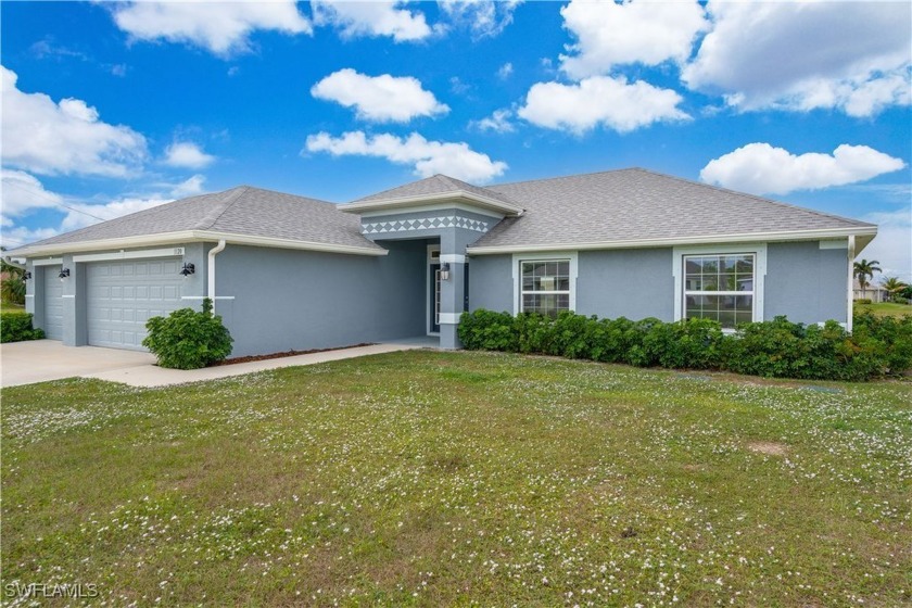 This stunning Cape Coral single-family home boasts 4 spacious - Beach Home for sale in Cape Coral, Florida on Beachhouse.com