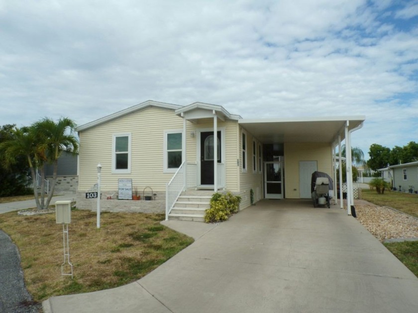 Move in ready, this two bedroom two bath home is just so very - Beach Home for sale in Punta Gorda, Florida on Beachhouse.com