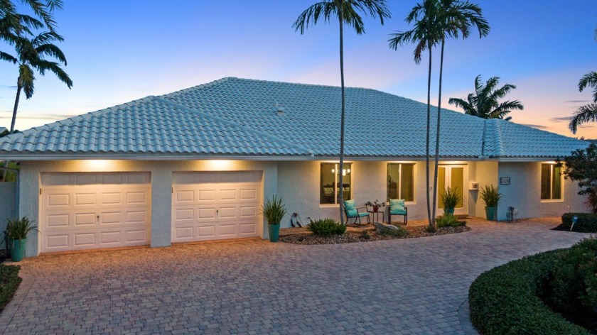 Welcome to this beautifully updated waterfront home with a - Beach Home for sale in Pompano Beach, Florida on Beachhouse.com