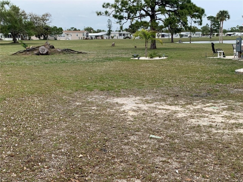 BEAUTIFUL LAKEVIEWS AWAIT YOU! Welcome to the friendly Village - Beach Lot for sale in Port Charlotte, Florida on Beachhouse.com