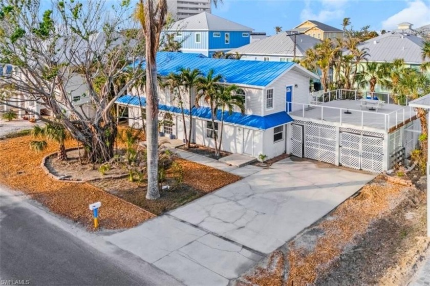 Located just a short stroll from the sandy beach, this ELEVATED - Beach Home for sale in Fort Myers Beach, Florida on Beachhouse.com