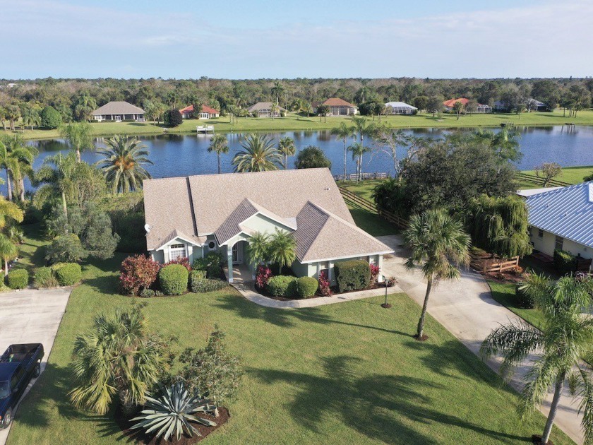 CUSTOM POOL HOME WITH COVETED EAST EXPOSURE LAKE VIEW. A NATURE - Beach Home for sale in Sebastian, Florida on Beachhouse.com