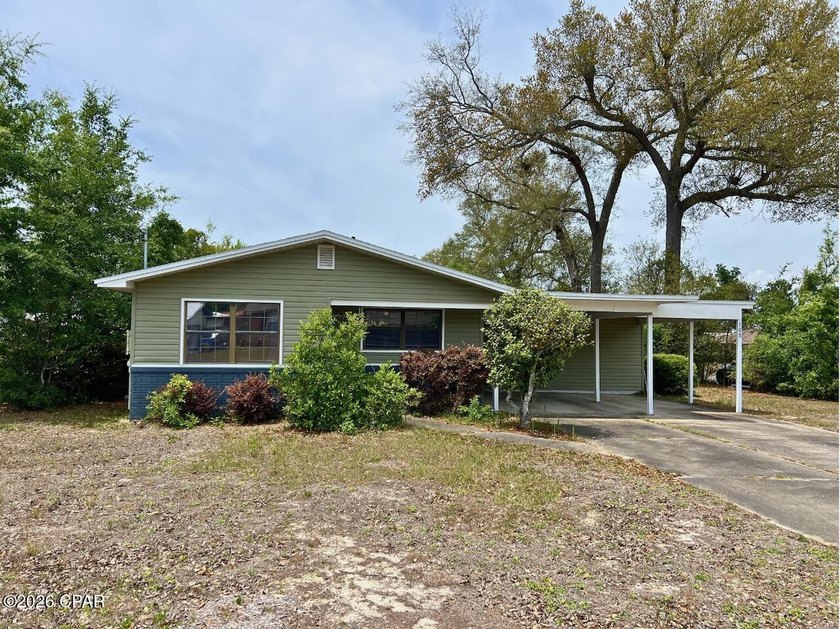 Welcome to this well-located 3-bedroom, 2-bath home situated on - Beach Home for sale in Panama City, Florida on Beachhouse.com