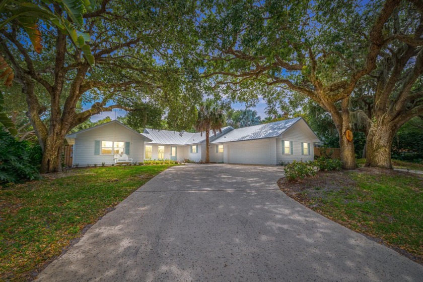 Nestled on a quiet tree-lined, dead-end street, this 3BR, 2.5 BA - Beach Home for sale in Sewalls Point, Florida on Beachhouse.com