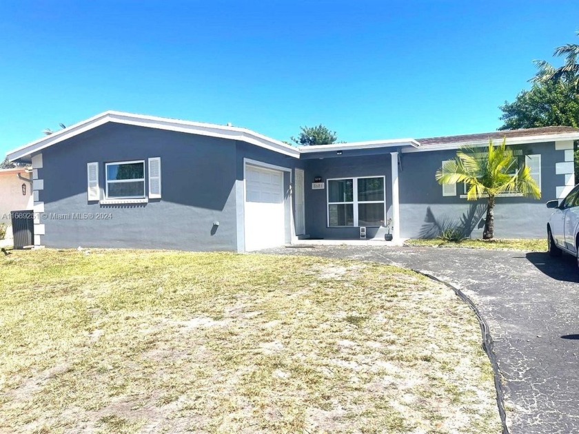 Great opportunity to own a beautifully remodeled single-family - Beach Home for sale in Sunrise, Florida on Beachhouse.com