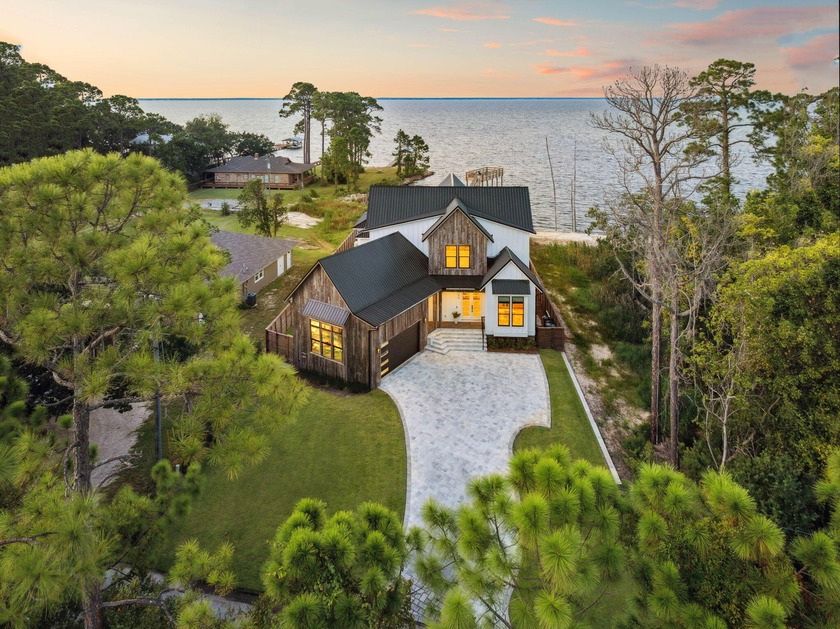 Welcome to this stunning new construction bay-front home in - Beach Home for sale in Miramar Beach, Florida on Beachhouse.com