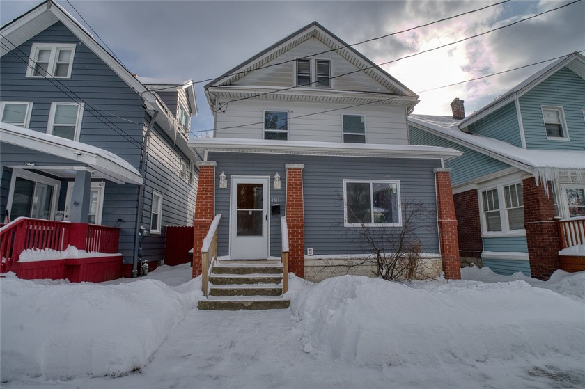 This charming residence has been thoughtfully updated & offers a - Beach Home for sale in Erie, Pennsylvania on Beachhouse.com