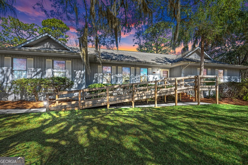 Tucked beneath majestic, mature oak trees along quiet roads that - Beach Home for sale in Saint Marys, Georgia on Beachhouse.com