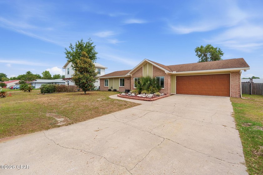 Welcome home to your updated, brick residence nestled in one of - Beach Home for sale in Lynn Haven, Florida on Beachhouse.com