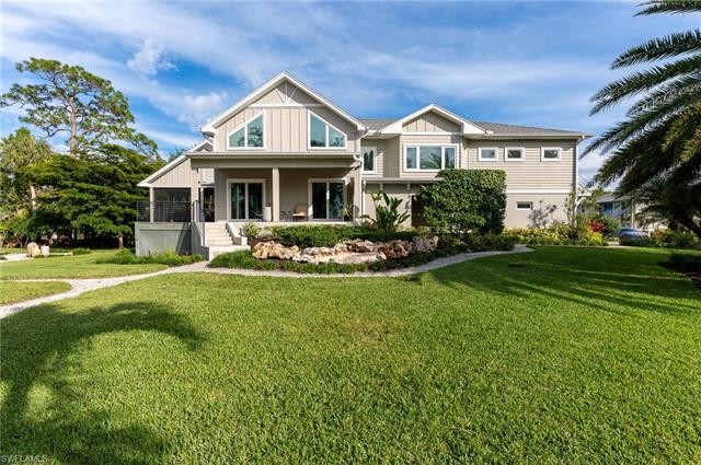 This stunning river front home boasts an Old Florida style - Beach Home for sale in Bonita Springs, Florida on Beachhouse.com