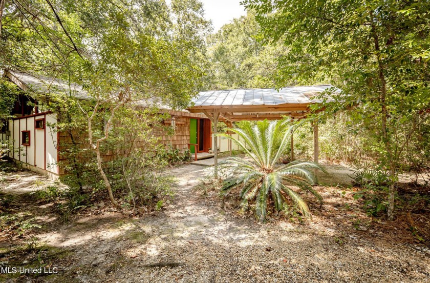 Step into a masterpiece of architectural wonder with this - Beach Home for sale in Ocean Springs, Mississippi on Beachhouse.com