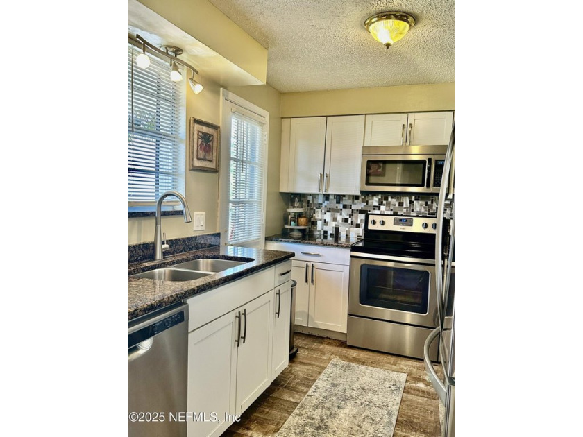 Beautifully Renovated 3-Bedroom Corner Condo - Move-In Ready in - Beach Condo for sale in Jacksonville, Florida on Beachhouse.com