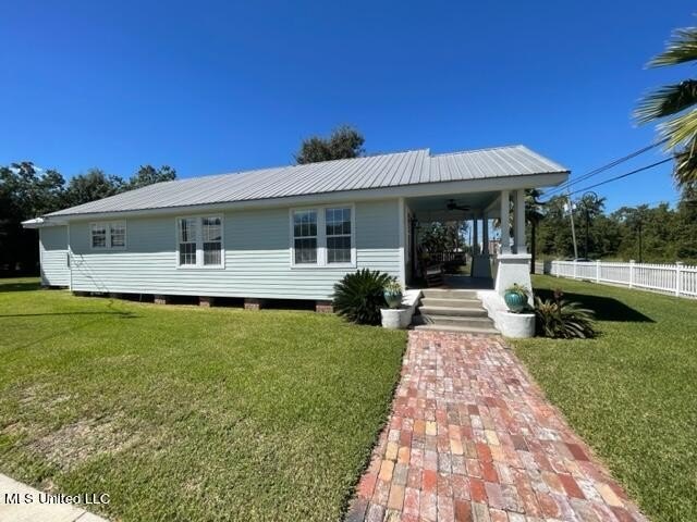 This lovingly renovated craftsman type cottage built in 1919 is - Beach Home for sale in Bay Saint Louis, Mississippi on Beachhouse.com