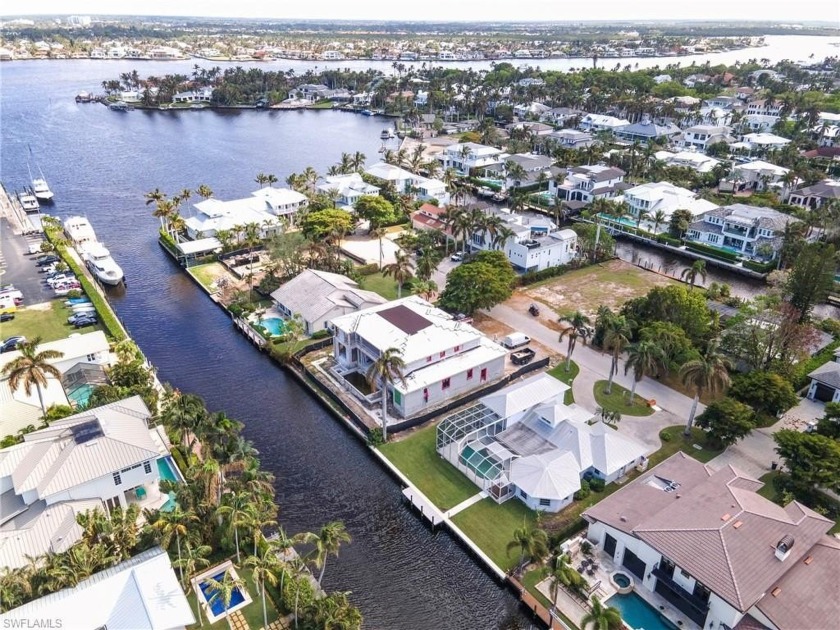 Discover an incredible opportunity in the prestigious Aqualane - Beach Home for sale in Naples, Florida on Beachhouse.com