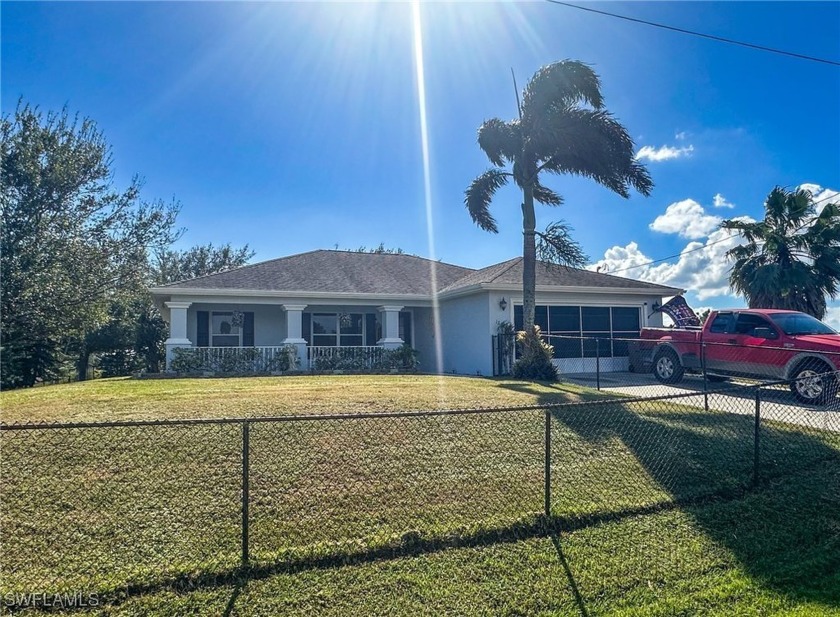 Welcome to this charming 3-bedroom, 2-bathroom home nestled on a - Beach Home for sale in Lehigh Acres, Florida on Beachhouse.com