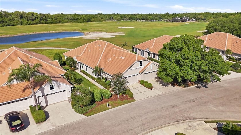 Positioned along the 18th hole of the private Legacy Golf Course - Beach Home for sale in Lakewood Ranch, Florida on Beachhouse.com