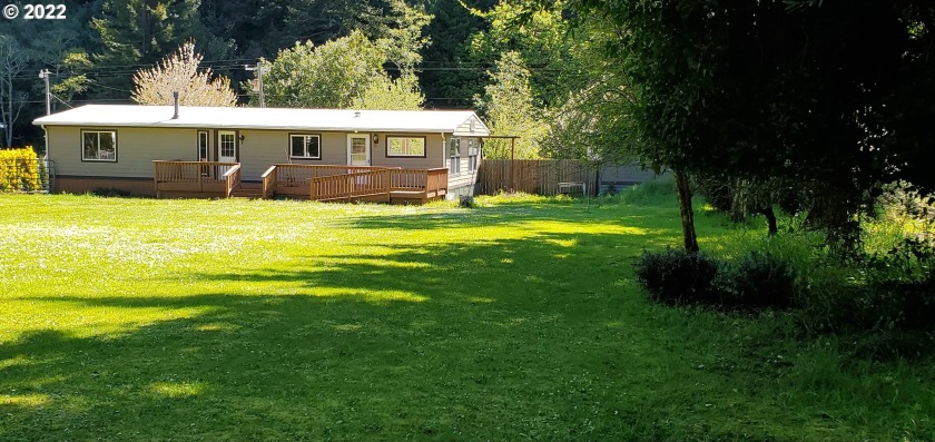 A couple of acres, on a creek with a very live-able home! - Beach Home for sale in Gold Beach, Oregon on Beachhouse.com
