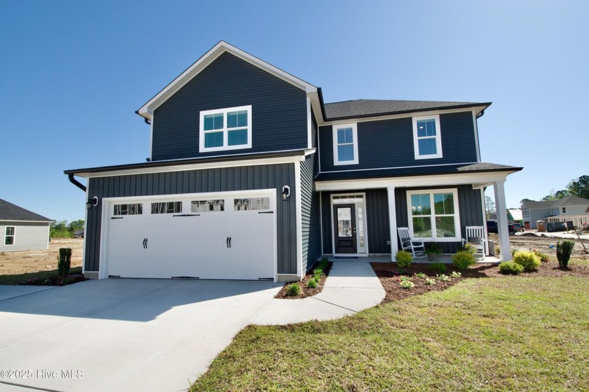 Located in the established, waterfront River Hills community - Beach Home for sale in Shallotte, North Carolina on Beachhouse.com