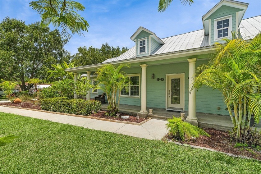 Tucked on nearly an acre in Vero Beach, this CBS home with - Beach Home for sale in Vero Beach, Florida on Beachhouse.com