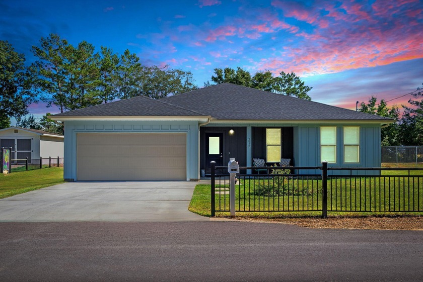 Built in 2025, this beautifully designed 4-bedroom, 2-bath home - Beach Home for sale in Navarre, Florida on Beachhouse.com