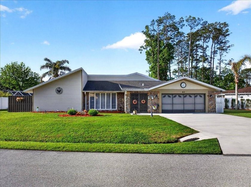 Positioned on a quiet, established lot directly across from Pine - Beach Home for sale in Palm Coast, Florida on Beachhouse.com
